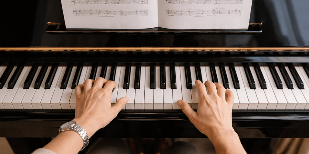 Student playing piano
